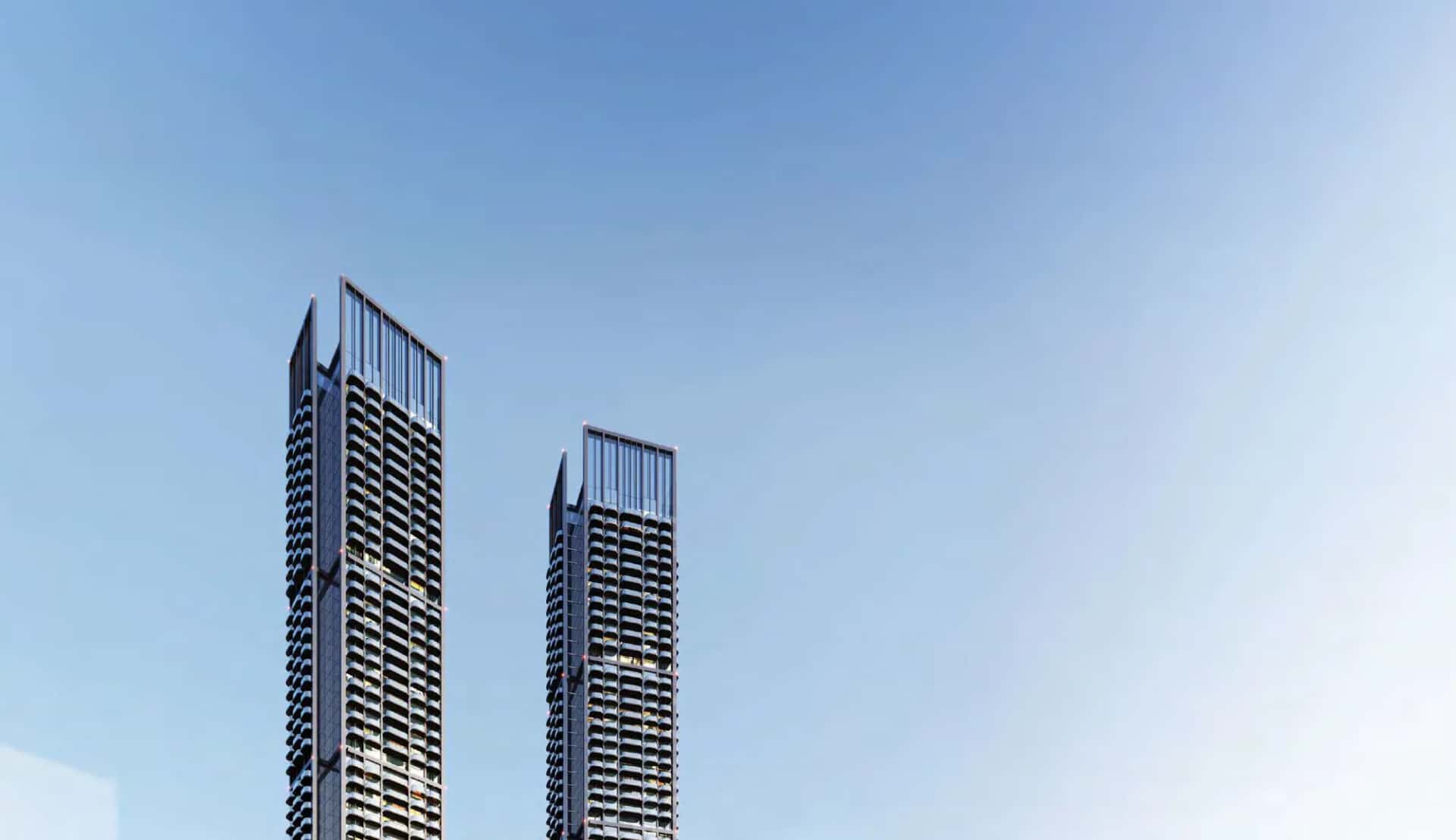 Ananda Residences twin towers rising above Motor City, Dubai