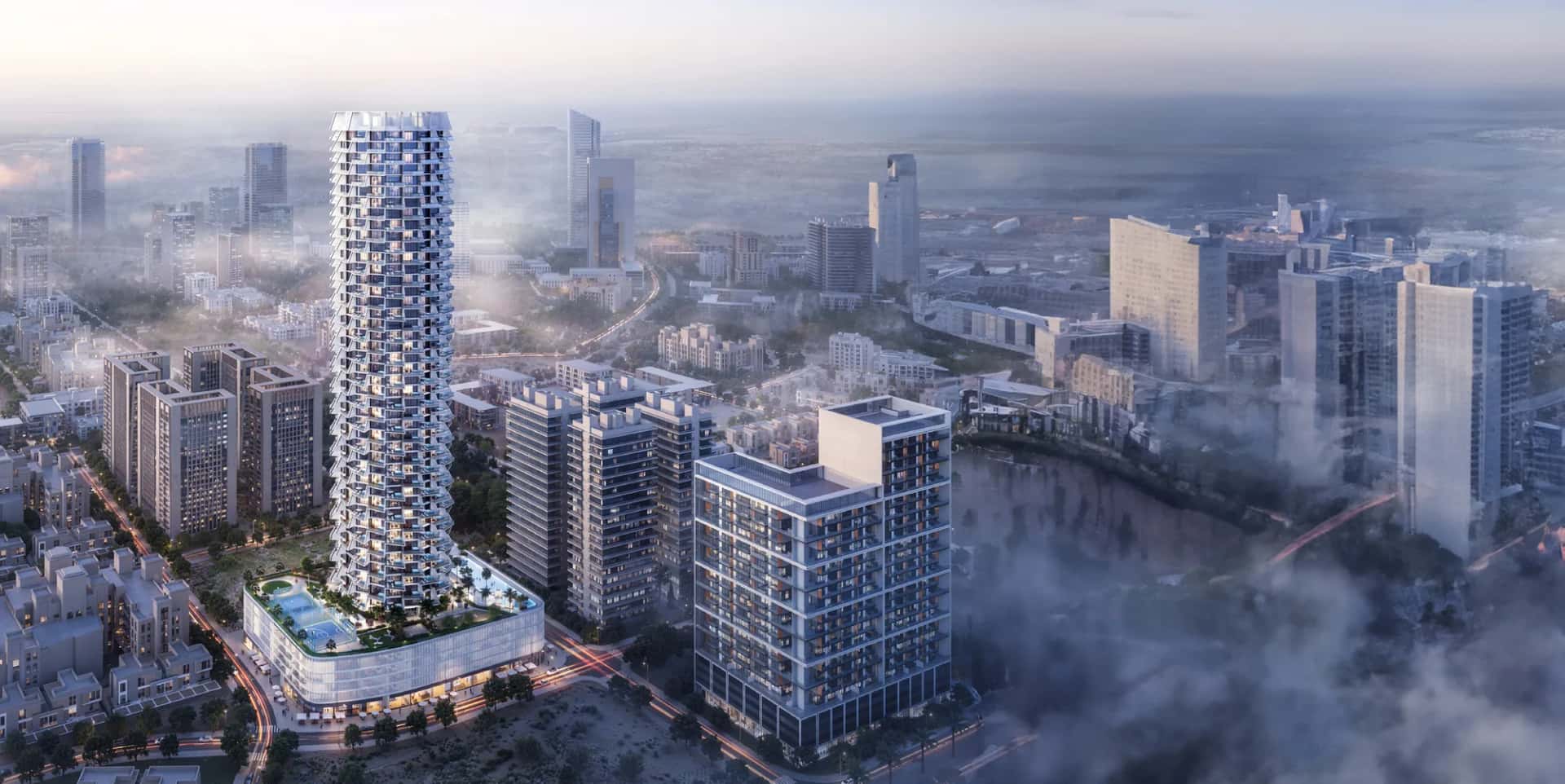 Binghatti Grove tower facade with landscaped amenity deck in Jumeirah Village Circle, Dubai