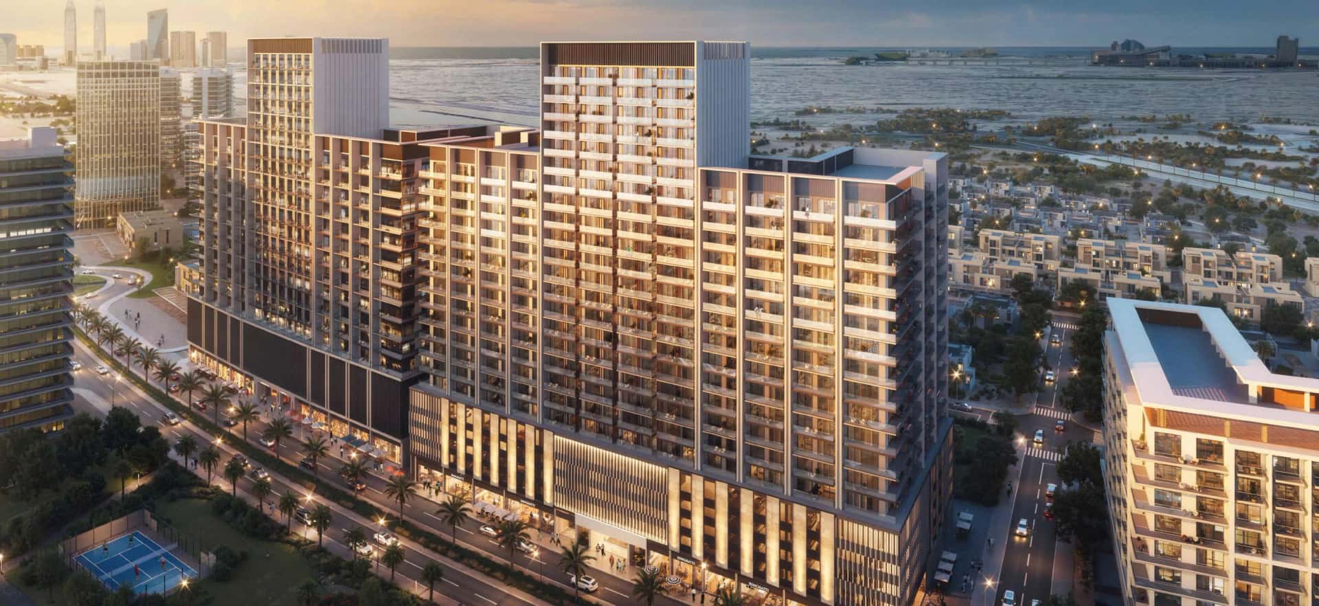 Binghatti Ruby tower exterior with crimson-gold façade in Jumeirah Village Circle, Dubai