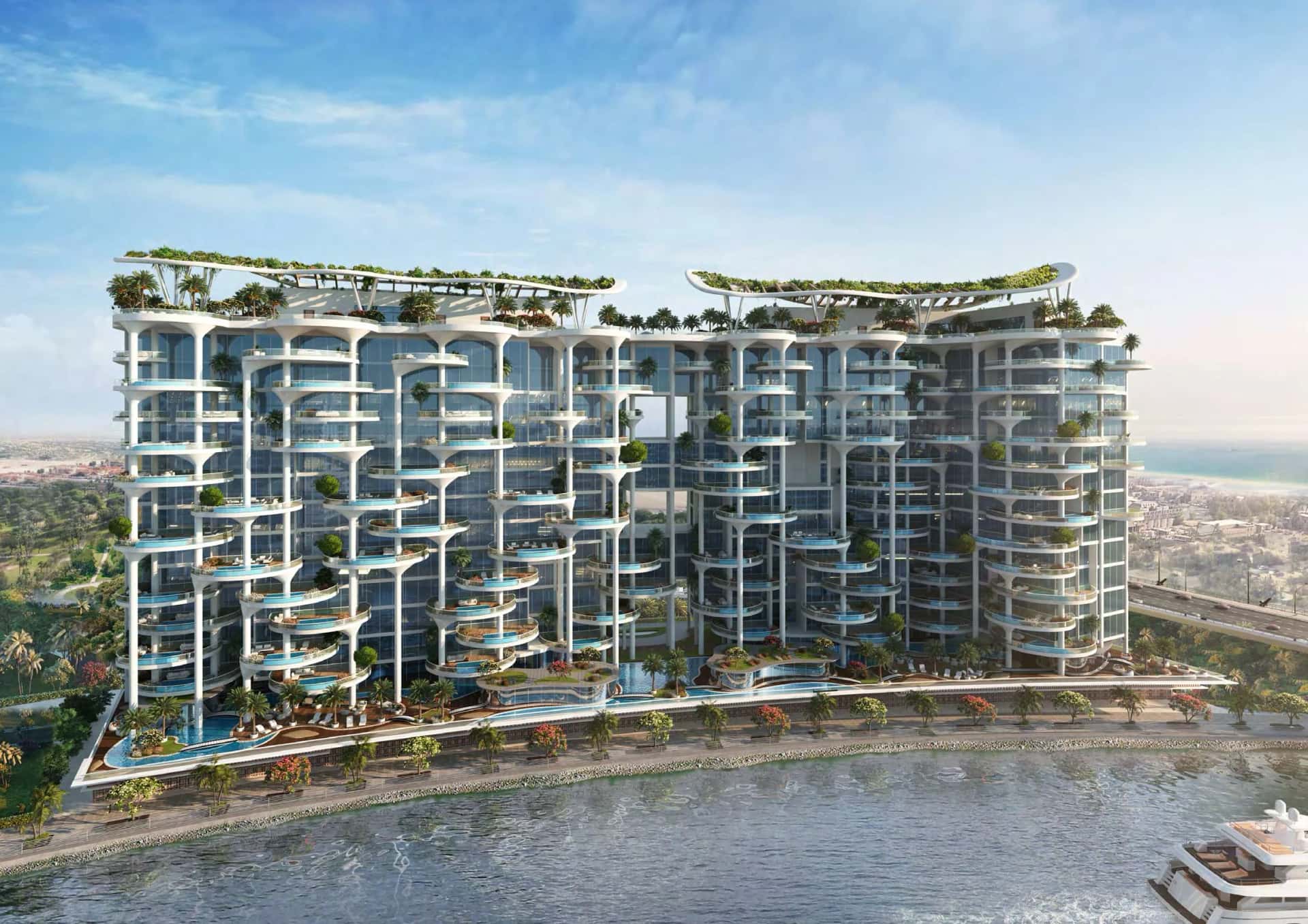 Cavalli Couture twin towers on the Dubai Water Canal in Business Bay, with planted terraces and canal views
