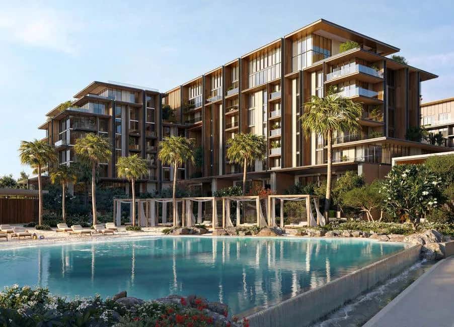 City Walk Crestlane 2 facade showing two mid-rise towers with waterscape and park in foreground, City Walk Dubai