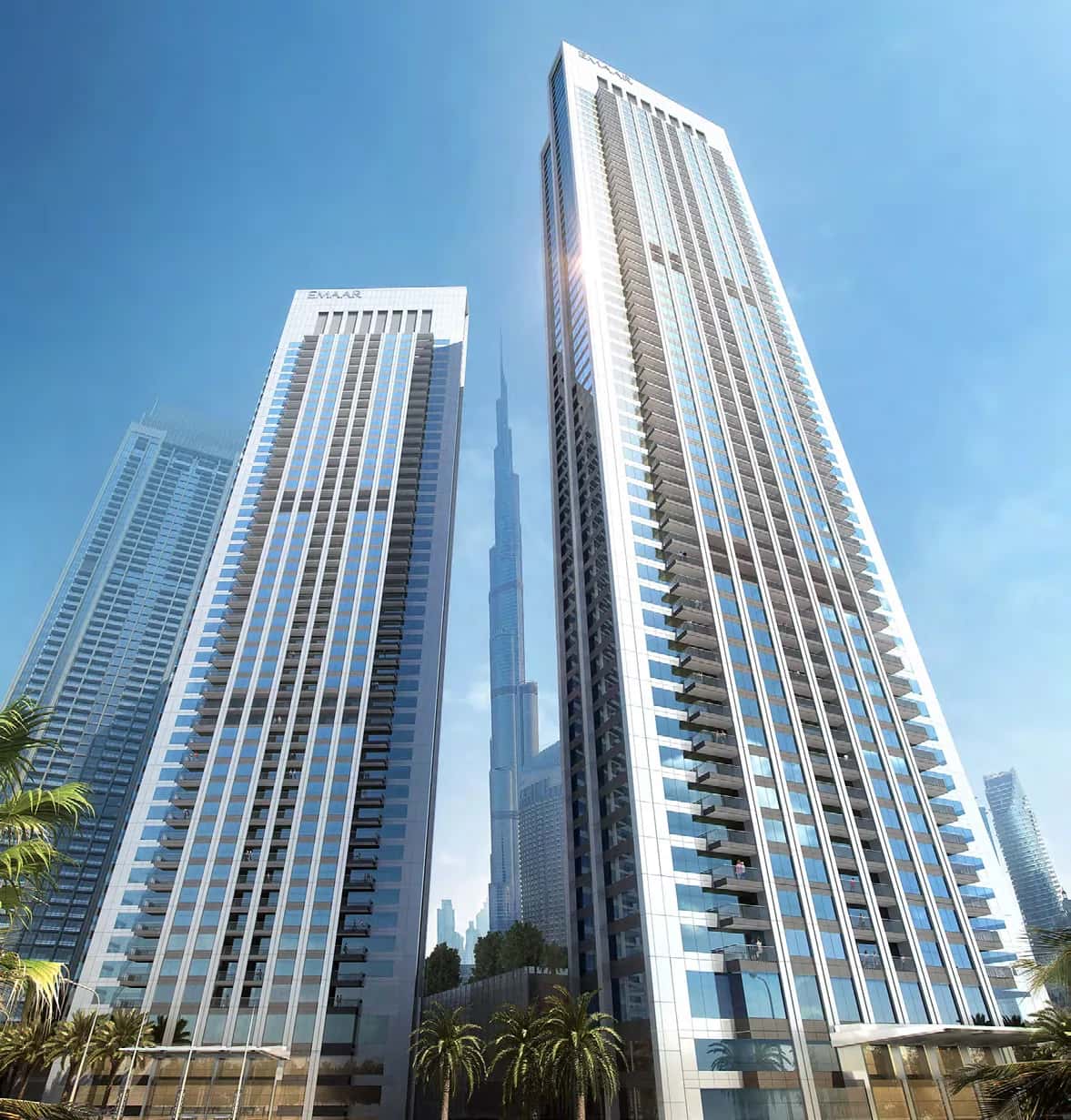 Downtown Views II by Emaar — three residential towers in Downtown Dubai with Burj Khalifa and city skyline views