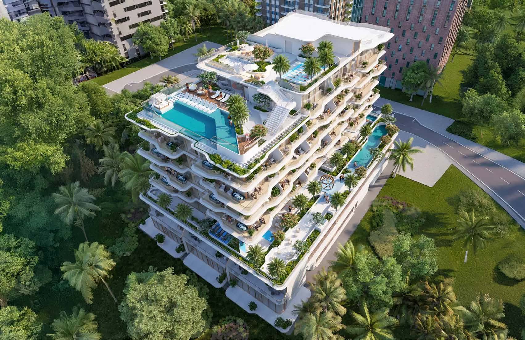 Flow Residences tower exterior with rooftop pool overlooking Palm Deira waterfront