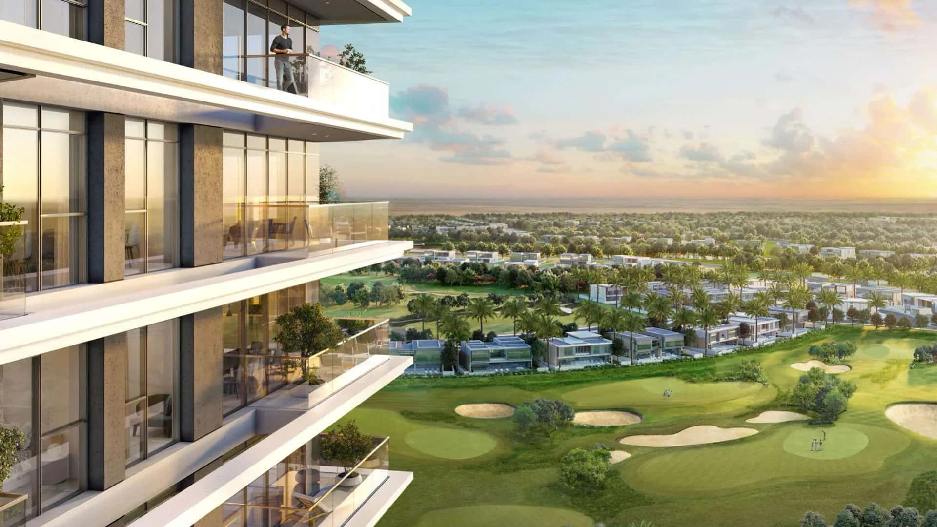 Golf Suites residential tower overlooking Dubai Hills Estate golf course