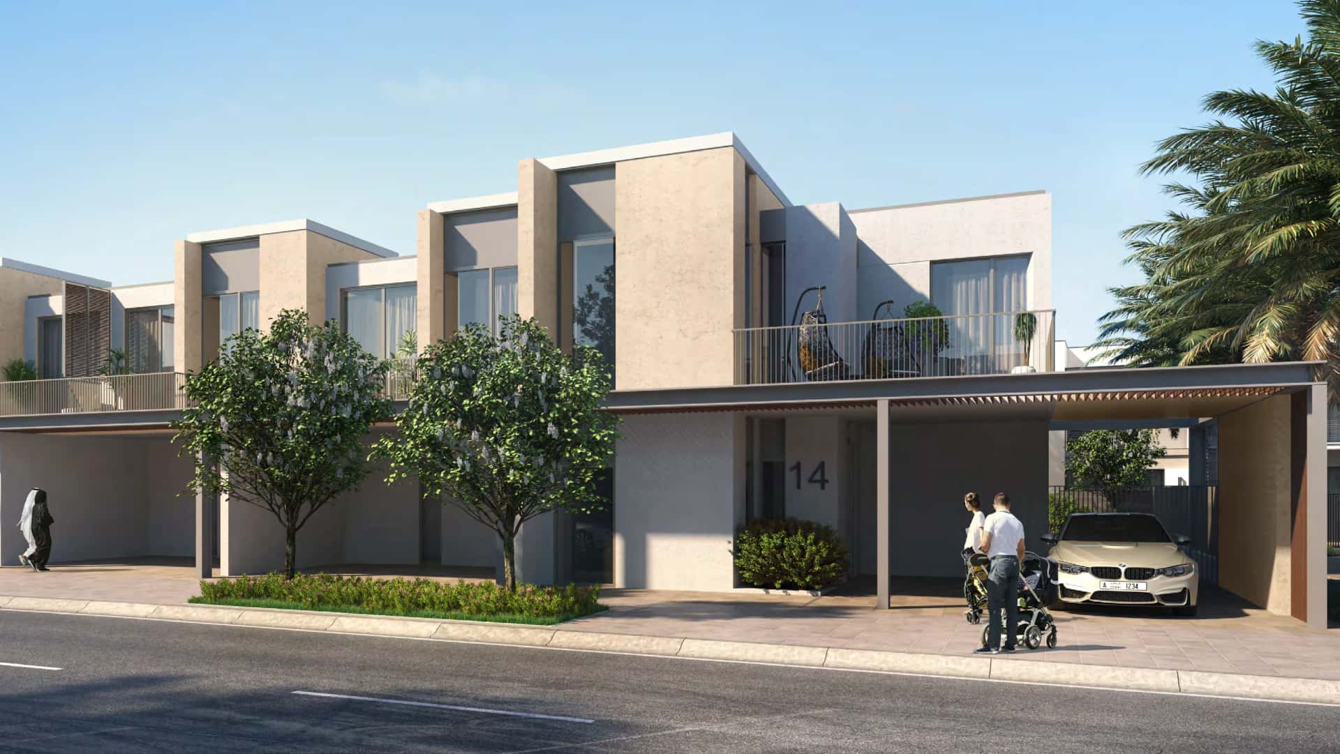 Joy Arabian Ranches III townhouses exterior with splash park and community boulevard, Dubai