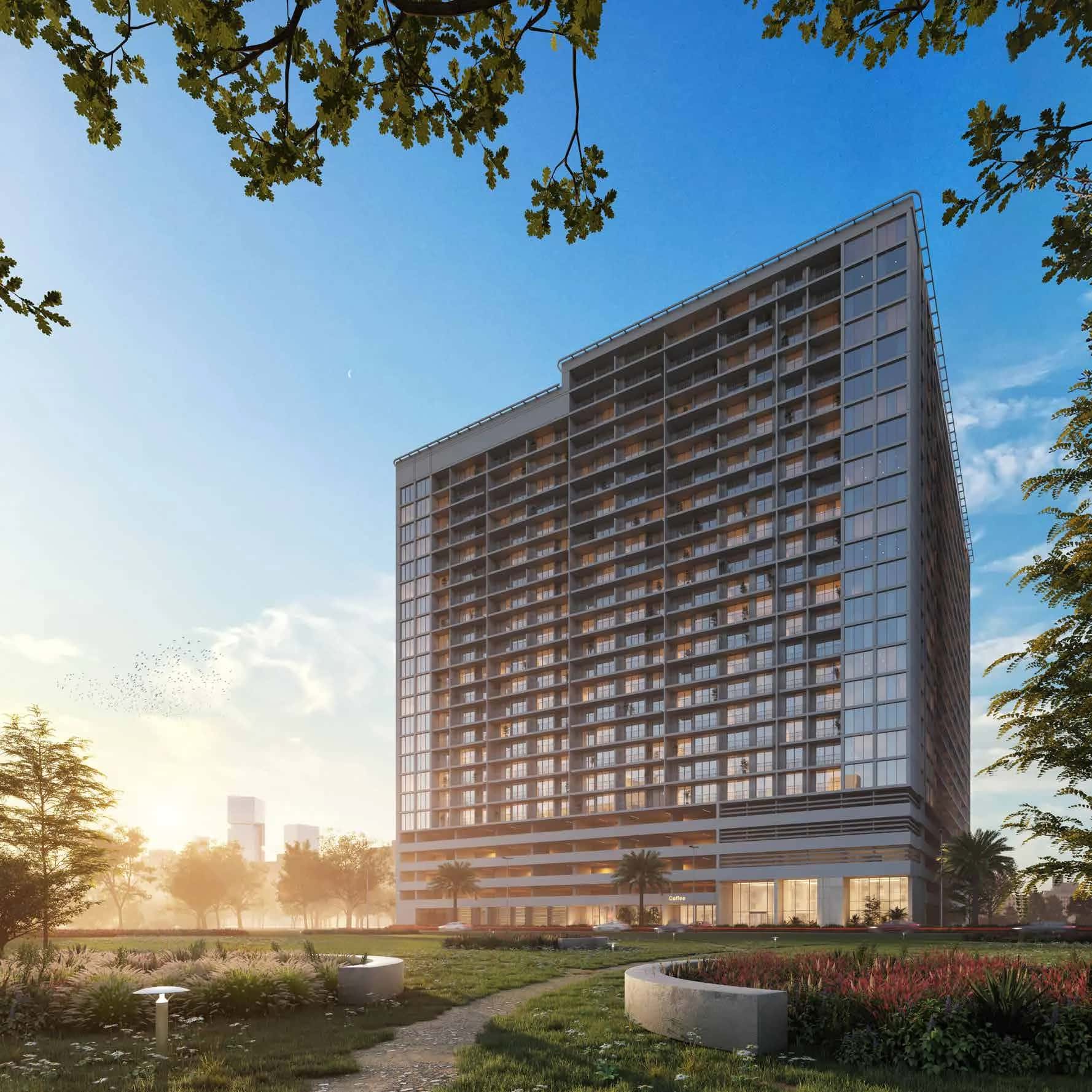 Luma Park Views residential tower in Jumeirah Village Circle, Dubai, showing rooftop pool and park views