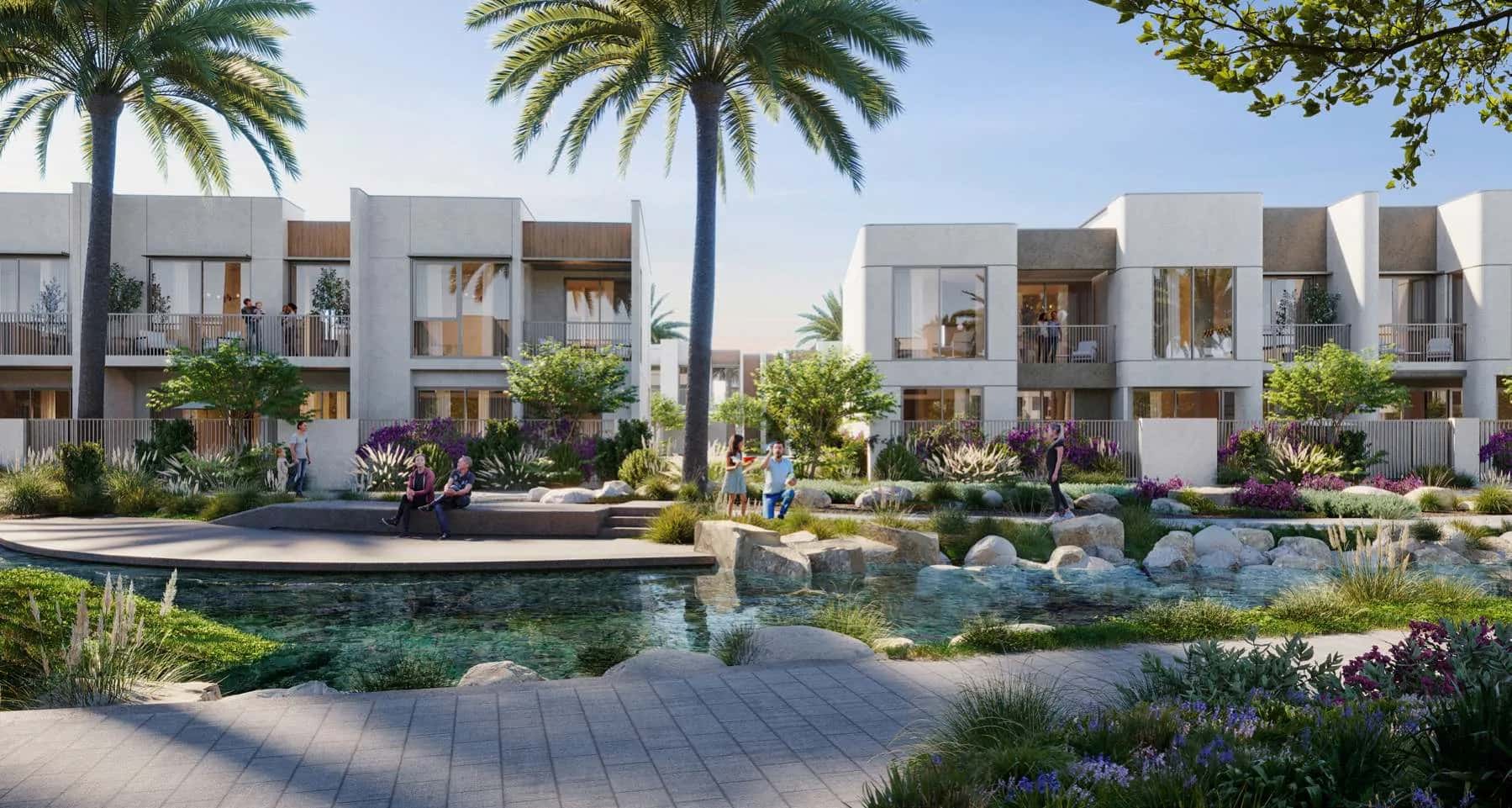 Nima townhouses at The Valley by Emaar showing waterway and landscaped community layout
