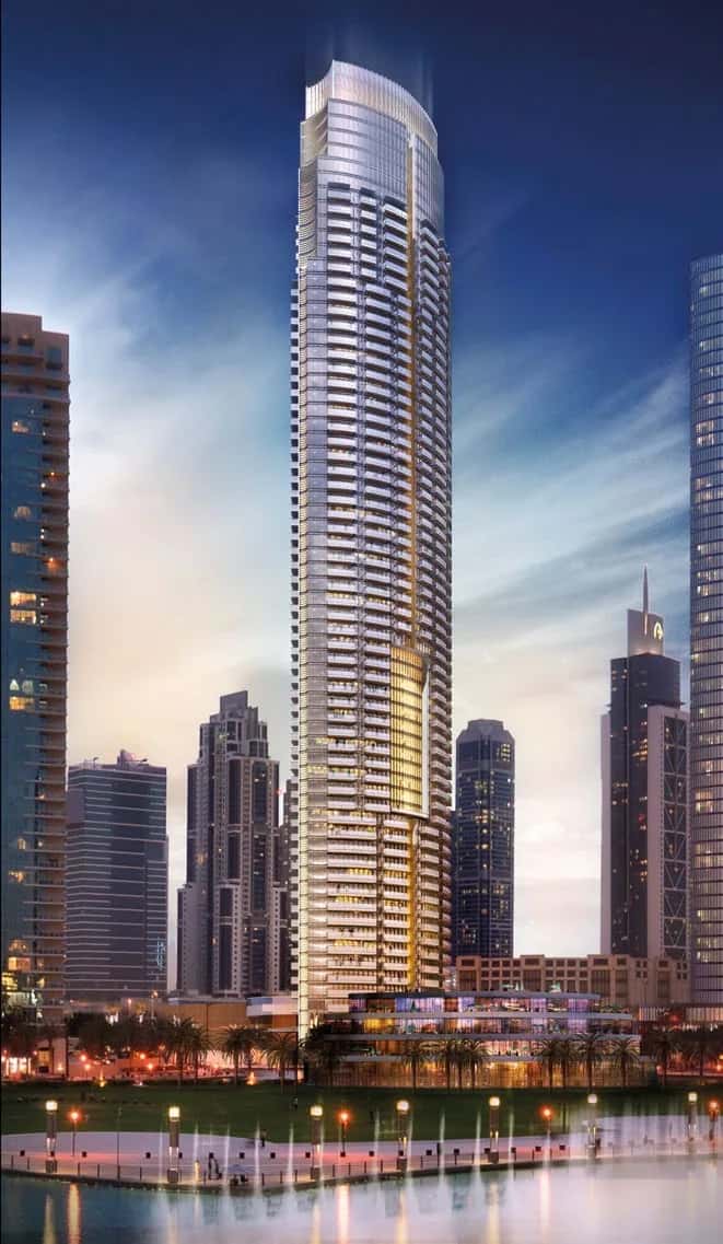 Opera Grand tower facade in the Opera District, Downtown Dubai, with Burj Khalifa visible in the background