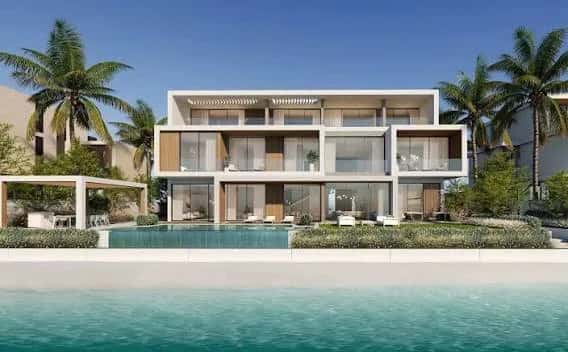 Beachfront villa exterior at Palm Jebel Ali Beach Collection with private garden and sea views