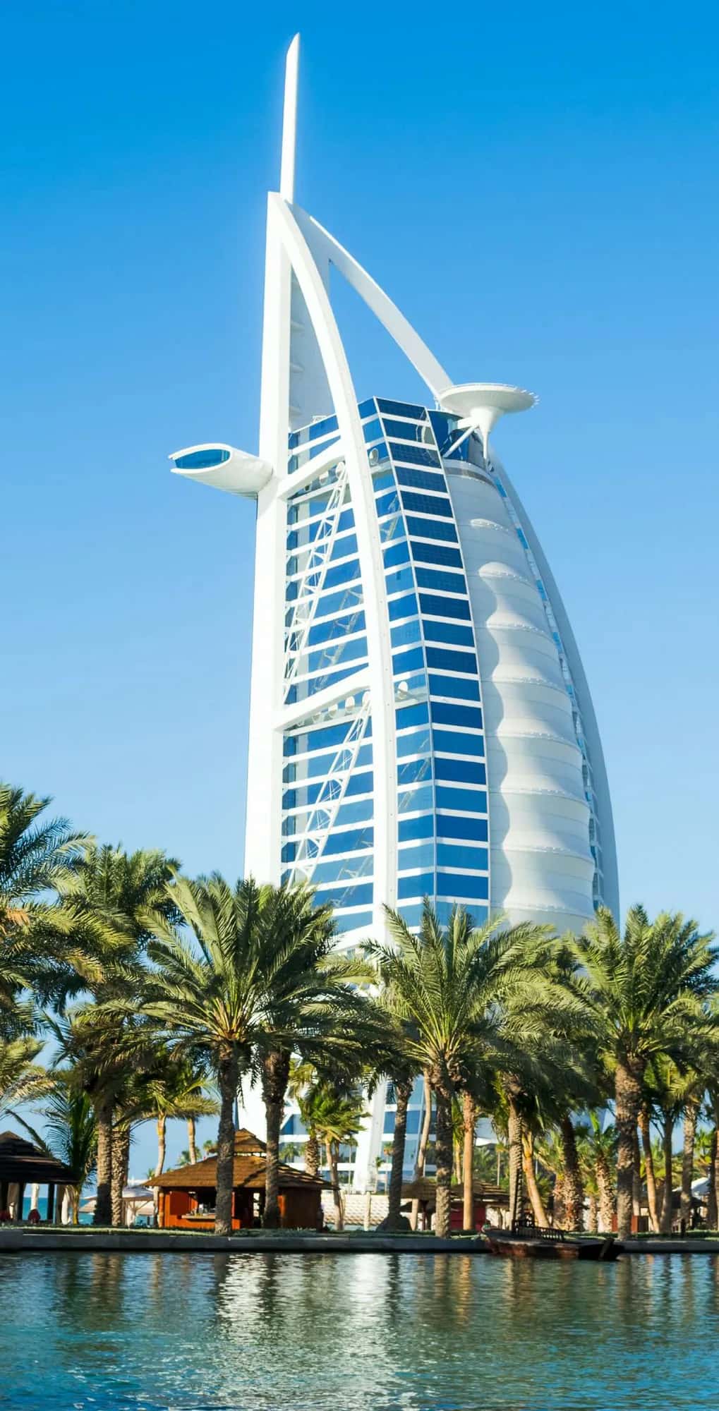 Exterior render of Peace Lagoons II residential tower with central lagoon in Dubai Land Residence Complex