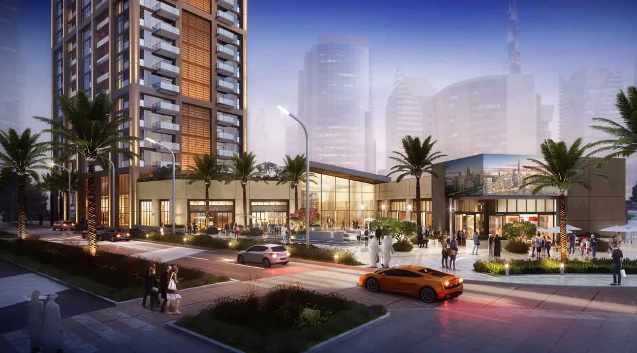 Peninsula Three tower rising above the Dubai Canal in Business Bay