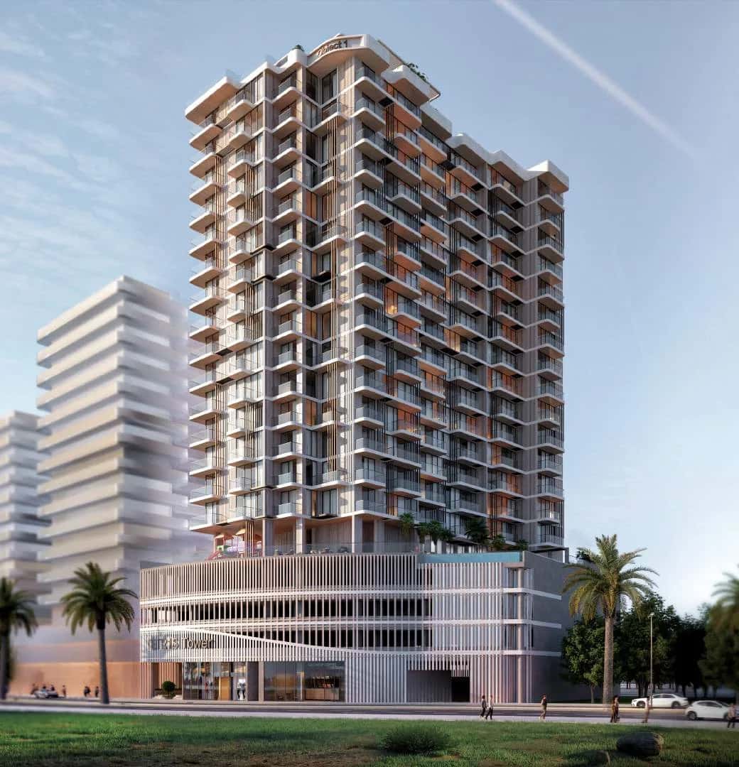 Tetris Tower curved residential facade in Jumeirah Village Circle, Dubai, with rooftop sky pool and podium amenities