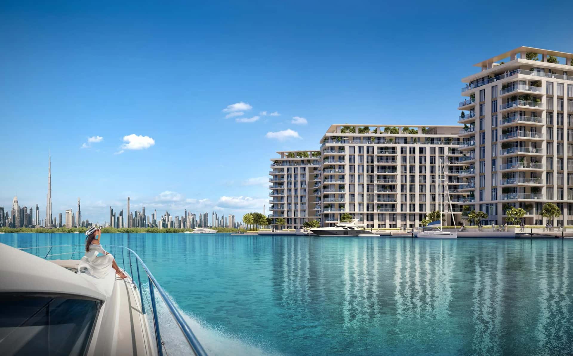 The Cove residential towers on Creek Island, Dubai Creek Harbour, with waterfront promenade and Dubai skyline views