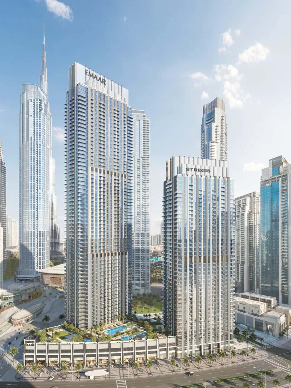 The St. Regis Residences Downtown Dubai — twin art-deco towers rising above the Opera District with Burj Khalifa in the background