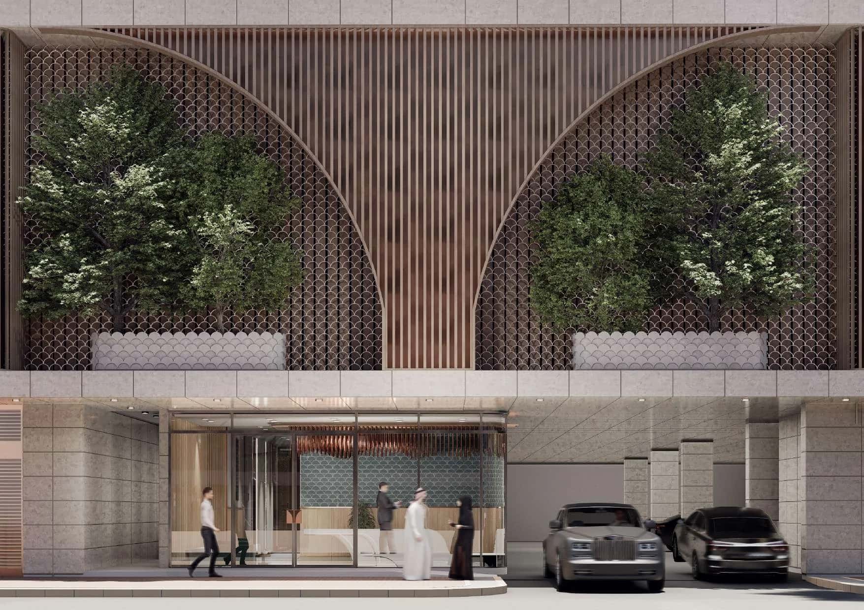 White Stone residential building facade with louvered balconies in Jumeirah Garden City, Dubai