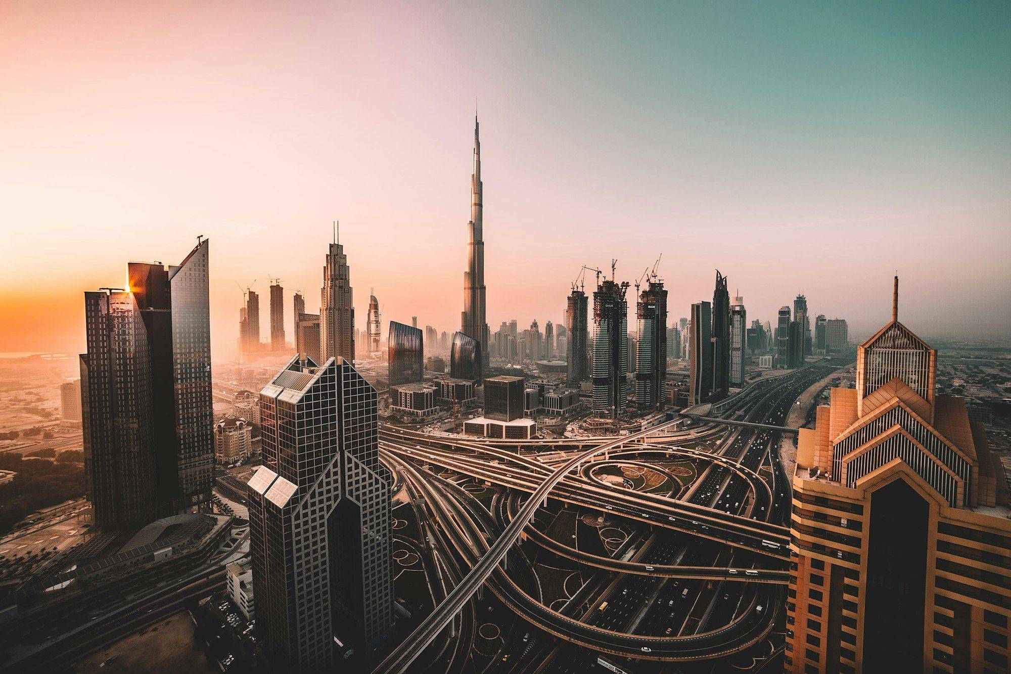 Dubai skyline with Burj Khalifa at sunset — Disruptive Real Estate buying guide
