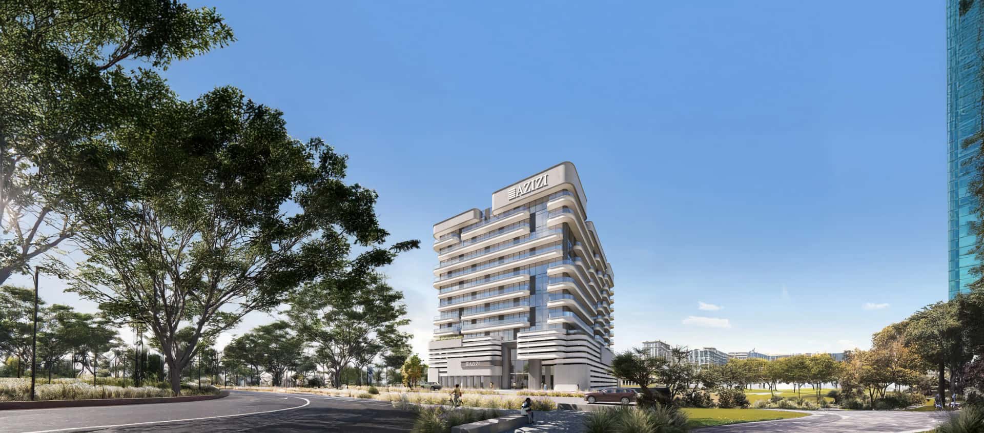 Azizi Amir residential tower exterior in Al Furjan, Dubai, featuring modern facade and podium amenities