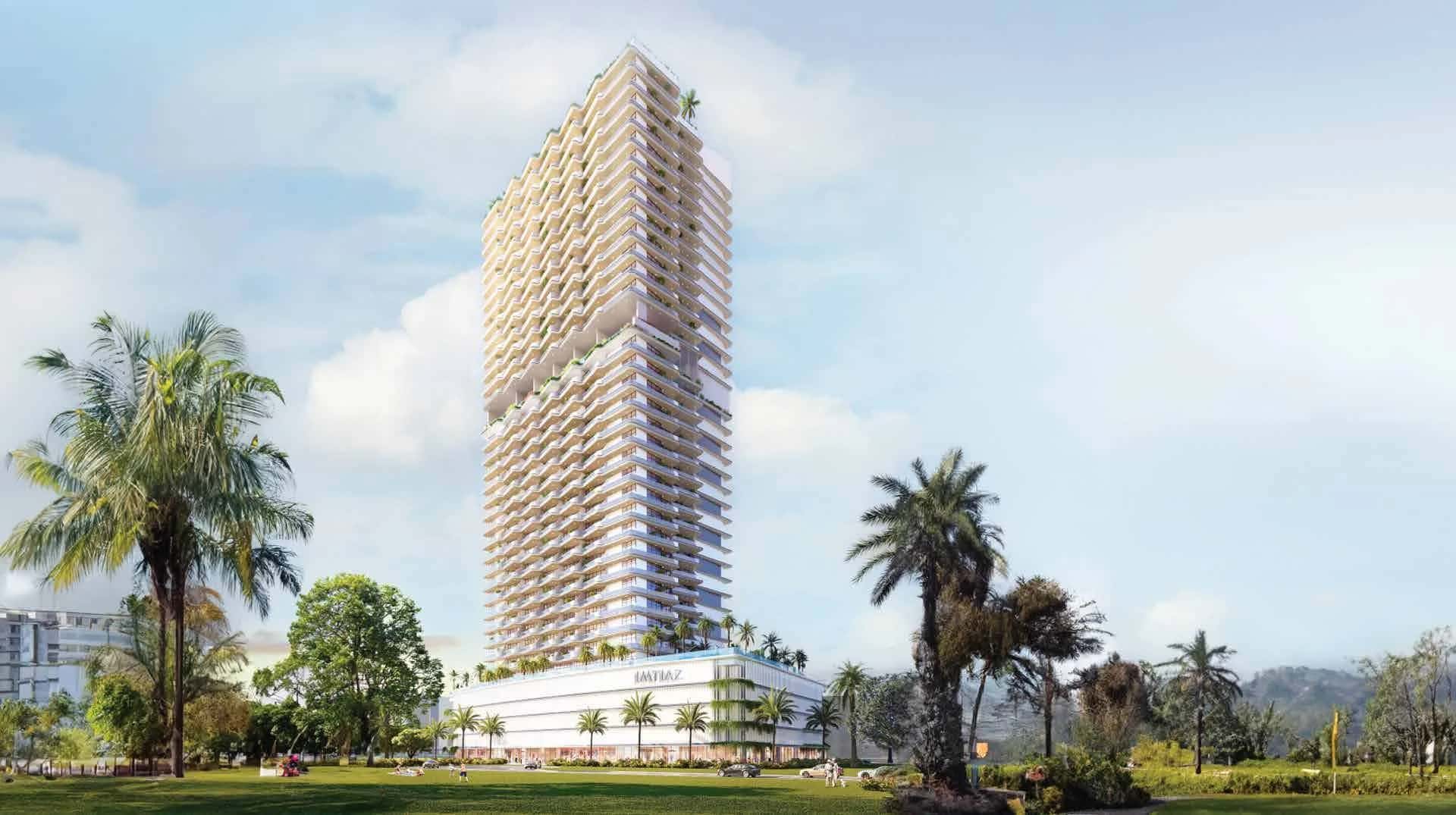 Cove Boulevard By Imtiaz tower exterior in Dubai Land Residence Complex showing rooftop pool and amenity levels
